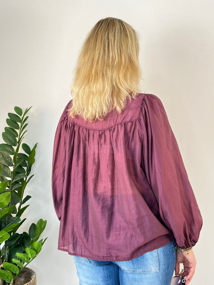 Blusa oversize con collo alto, bordeaux
