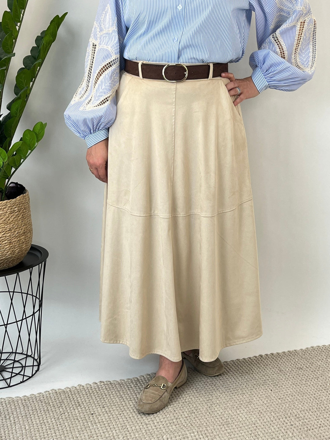 Beige faux suede A-line midi skirt with decorative brown belt and gold buckle