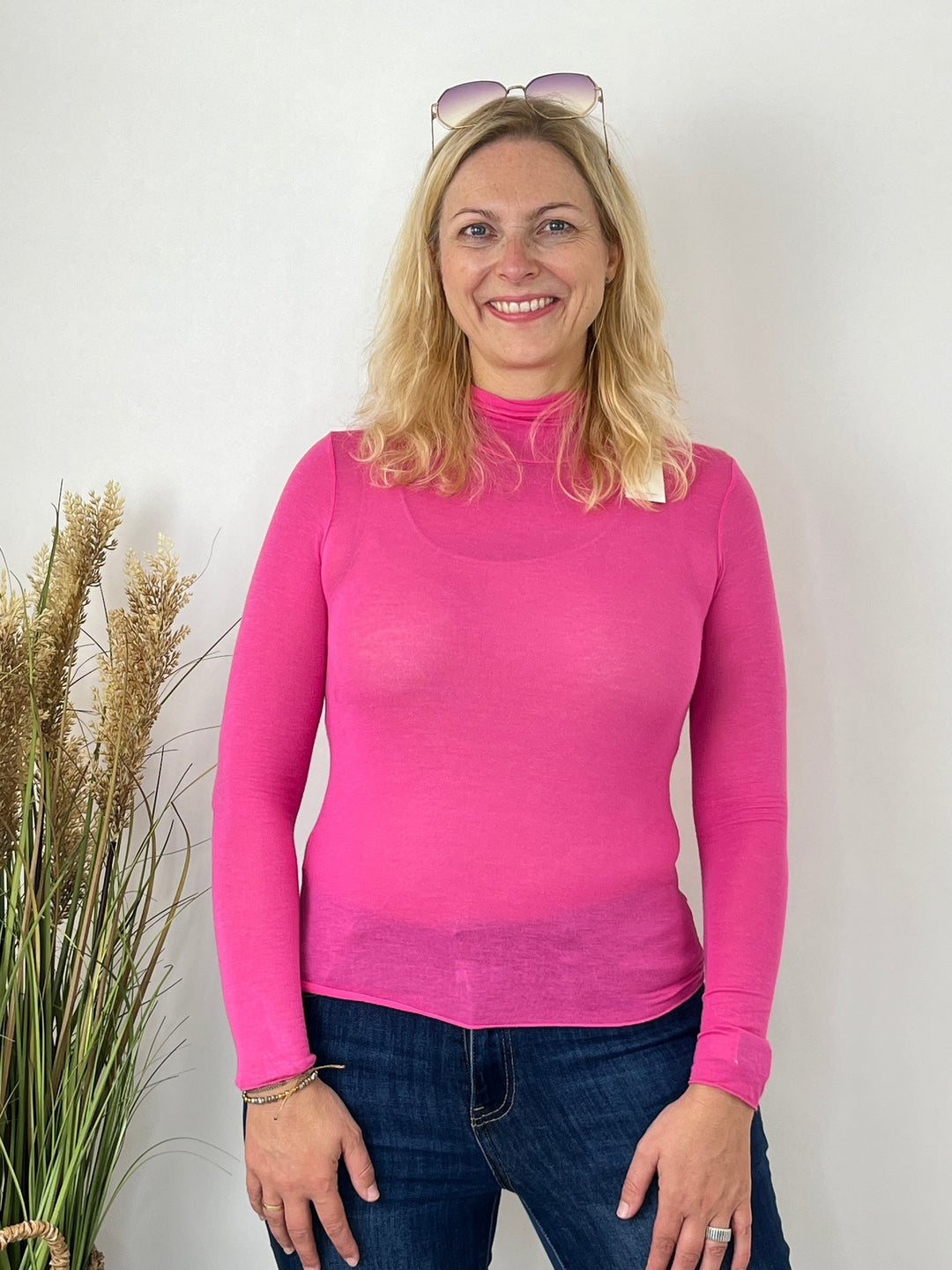Pinkes Cashmere Rollkragenshirt mit körpernaher Passform
